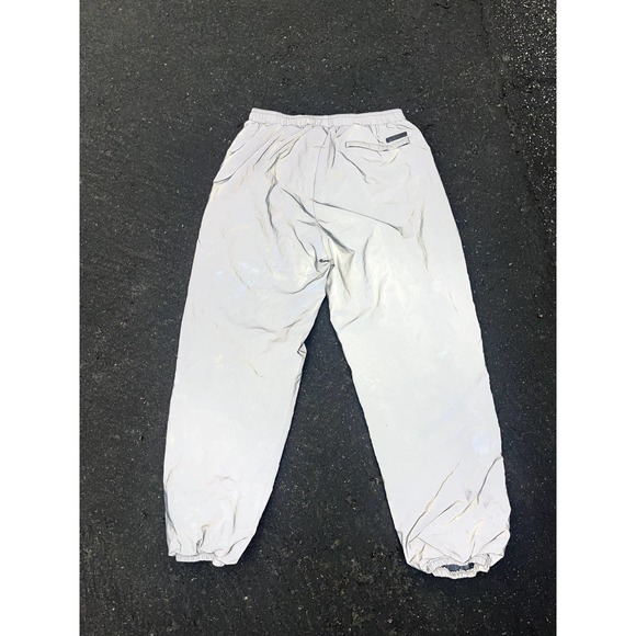 UNDEFEATED 3M Reflective Warm Up Track Pants - Picture 3 of 6